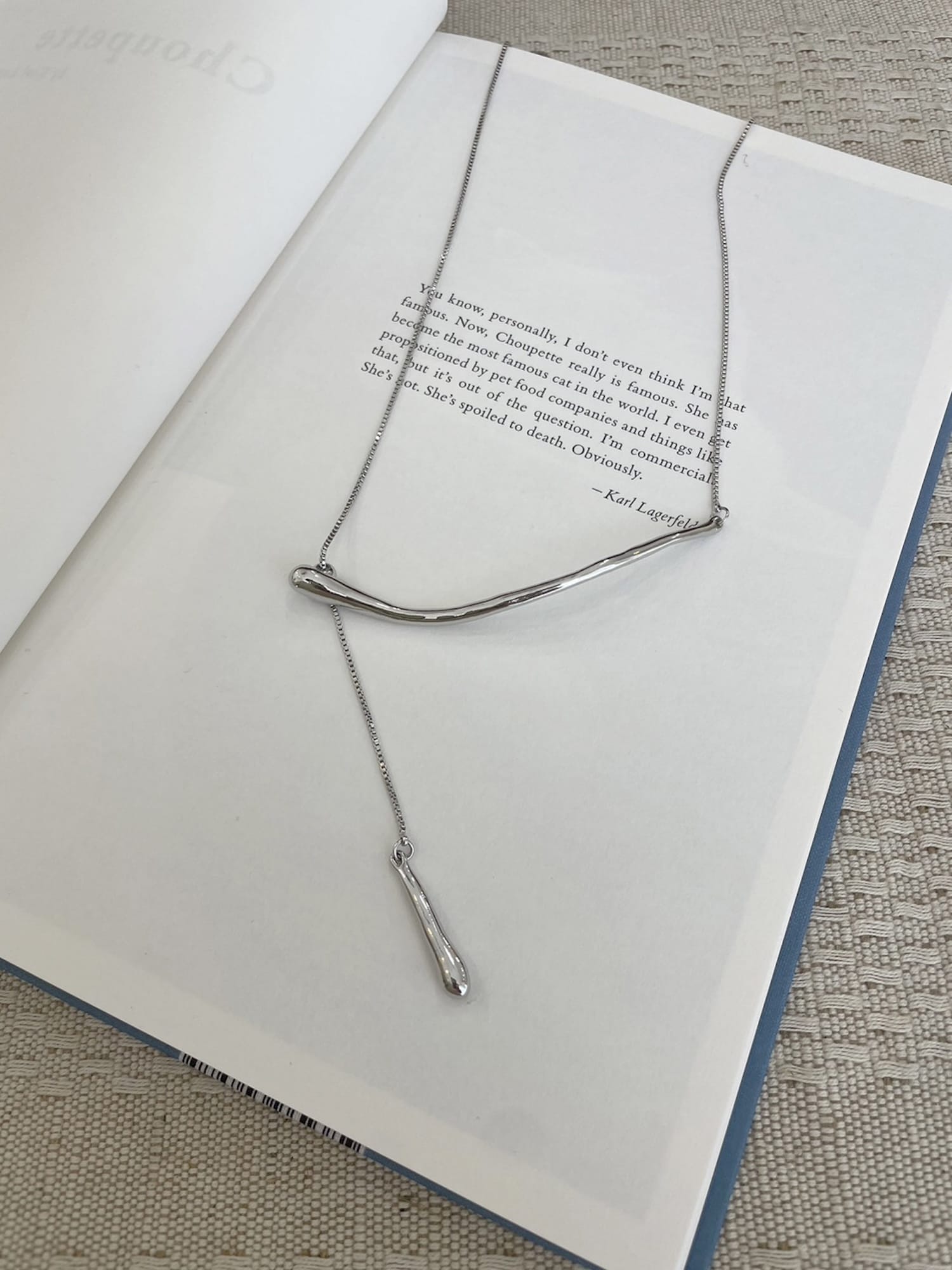 SLV asymmetry necklace